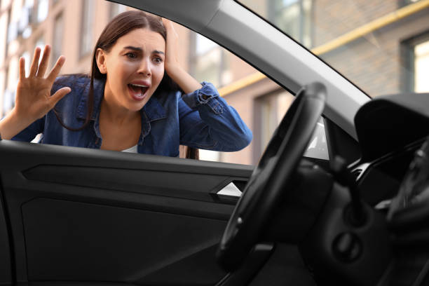 key forgotten inside. Emotional woman looking through car window good thing Jersey strong is always available for any lockout service in NJ